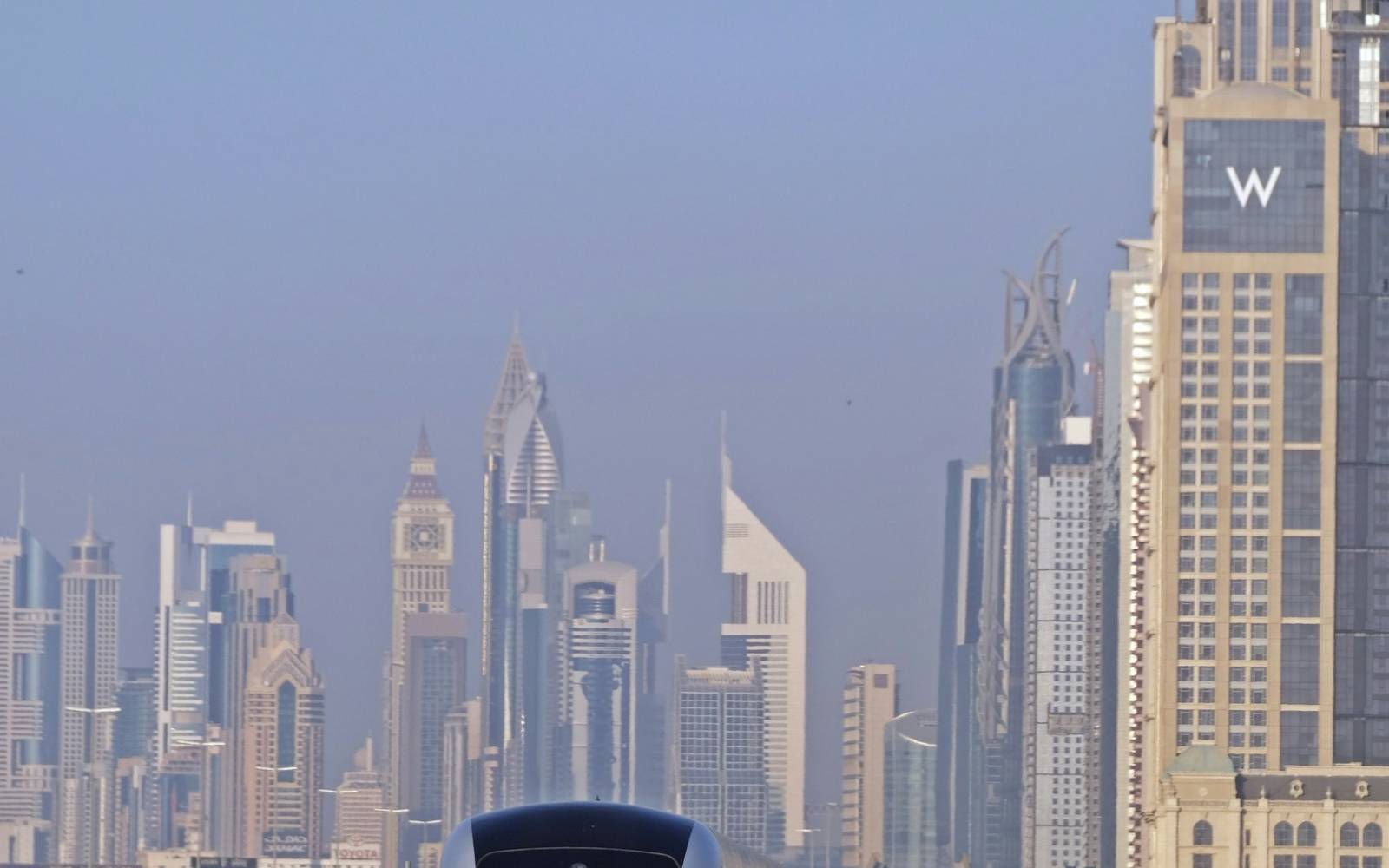A Dubai Metro train approaching on elevated track