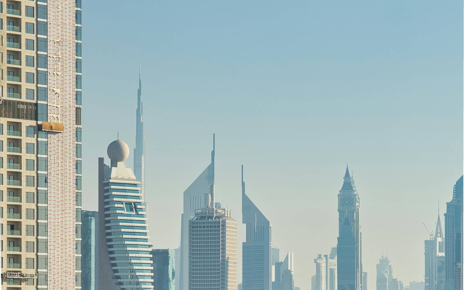 A Dubai Metro train running through the city
